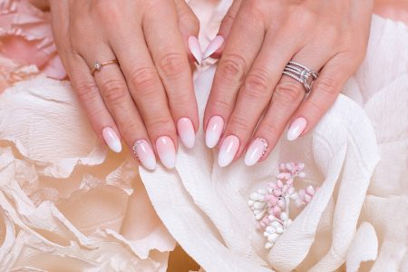 female-hands-with-ombre-manicure-nails-pink-gel-polish